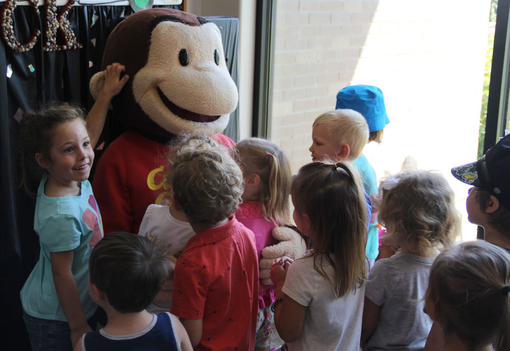 Curious George Swings By The Library Lifestyle Youth