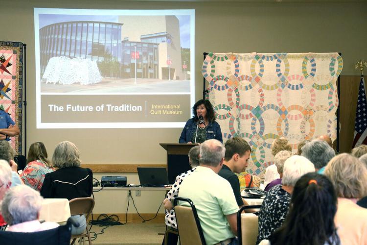 Local and international quilts displayed for an evening of quilt history