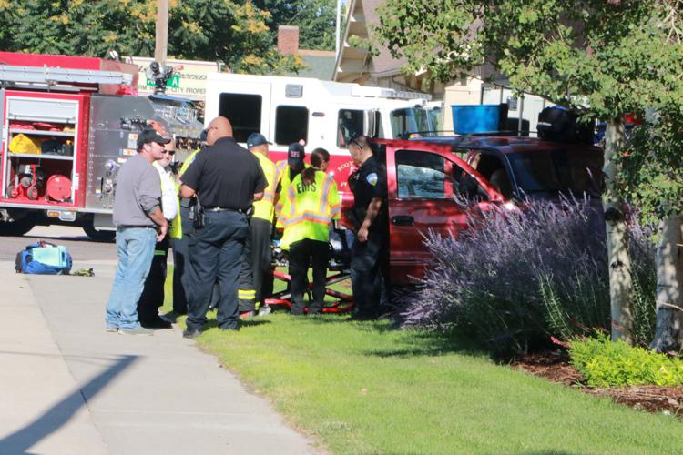 Woman transported to hospital after collision