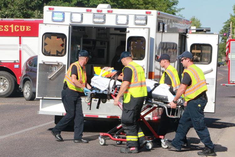 Woman transported to hospital after collision