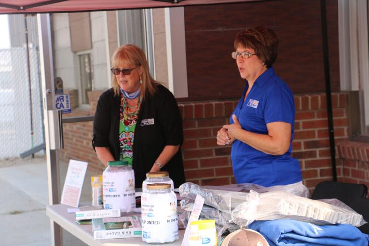 Twin City Roofing donates $52,500 to United Way