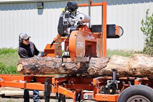 Touched by fire: Sawmill demonstration highlights uses for trees damaged by wildfires
