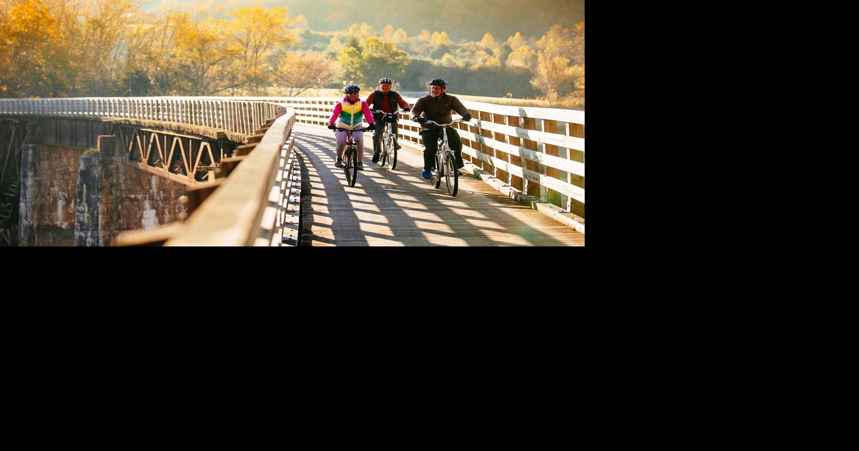 Visitors enjoy a ride on the Virginia Creeper Trail.