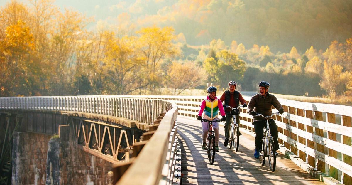 Visitors enjoy a ride on the Virginia Creeper Trail.