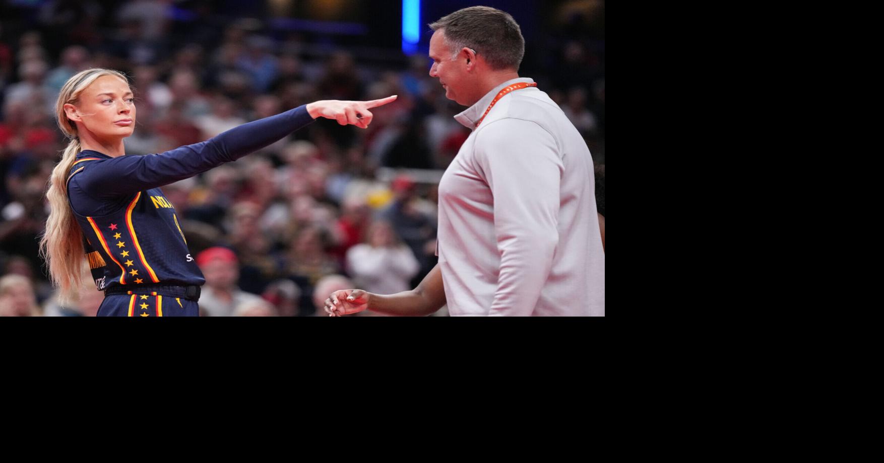 Indiana Fever guard Sophie Cunningham (8) points to Phoenix Mercury forward-guard DeWanna Bonner (24) after an argument broke out Monday, June 22, 2026, during the game at Gainbridge Fieldhouse in Indianapolis. The Indiana Fever defeated the Phoenix Mercur