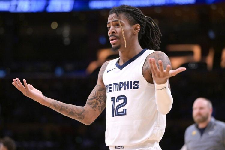 usa-memphis-grizzlies-guard-ja-morant-12-reacts-in-the-second-half-against-the-los-angeles-lakers-at-cryptocom-arena