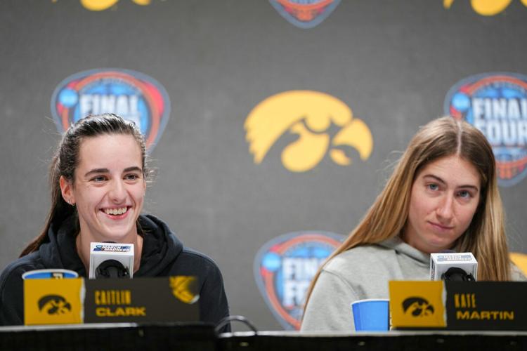iowa-hawkeyes-guard-caitlin-clark-and-guard-kate-martin-20-take-questions-before-the-final-four-round-of-the-ncaa-womens-basketball-tournament-thursday-april-4-2024-in-cleveland--