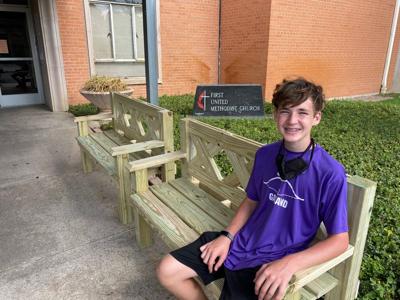 A place to sit: Boy Scout builds benches for church