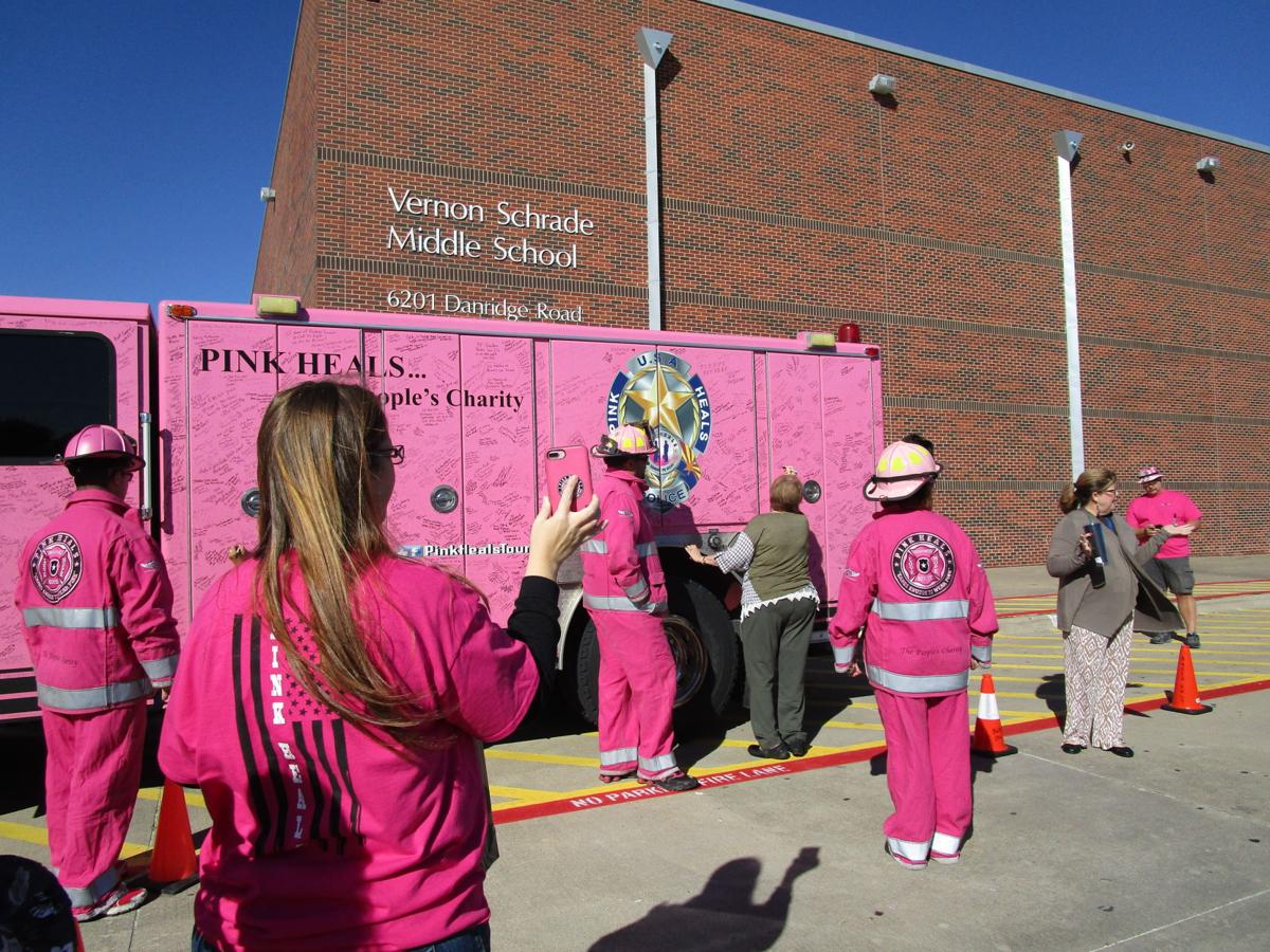 Pink Heals surprises Schrade Middle School staff with hugs, love