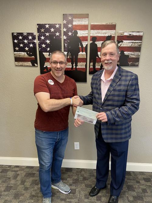 Rowlett Housing Finance Corporation donates to veteran cause