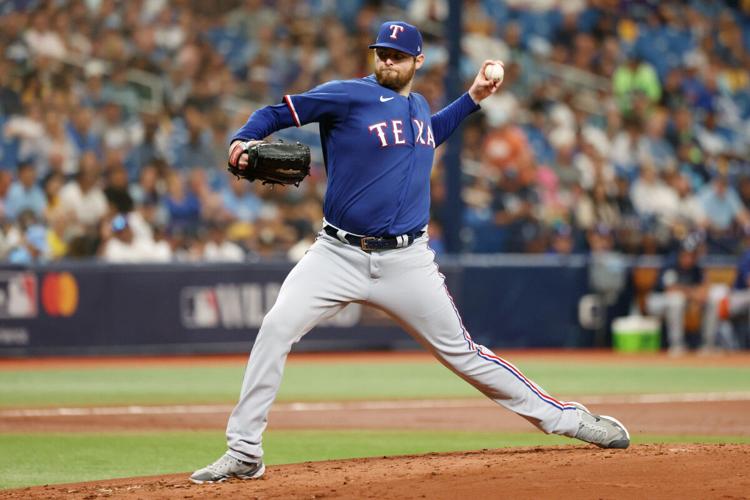 MLB roundup: Rangers run past Rays on wild pitch