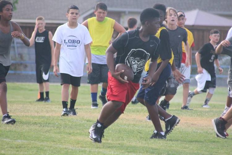 Lakeside Middle School football campers compete in touch football game