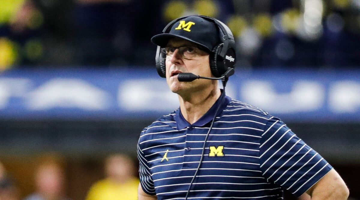 Jim Harbaugh calls Michigan president to say he's staying - The