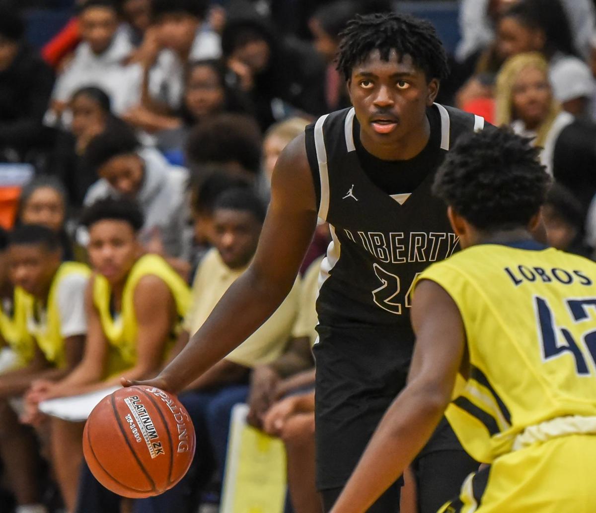 Liberty Lands Lobos First Loss On Hardwood Sports