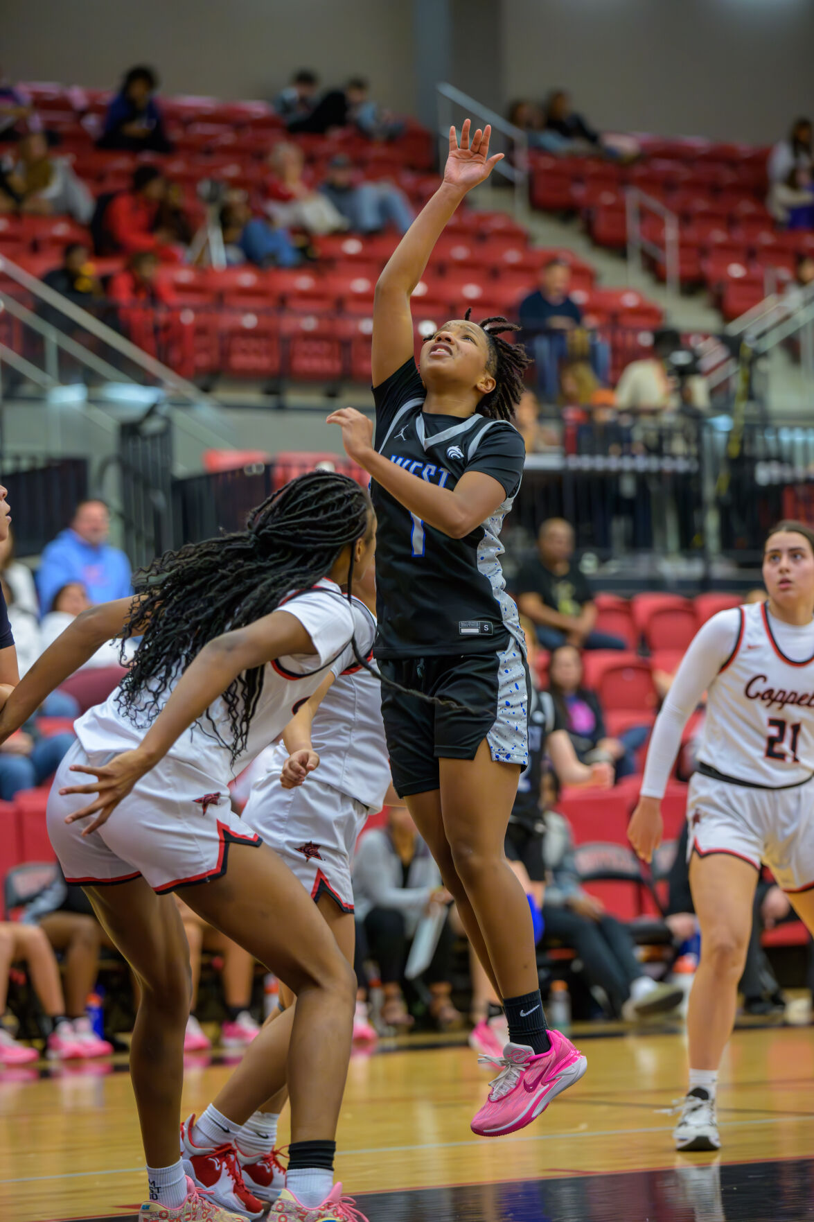 Plano West Girls Basketball Team Triumphs Over Flower Mound in Thrilling District Matchup