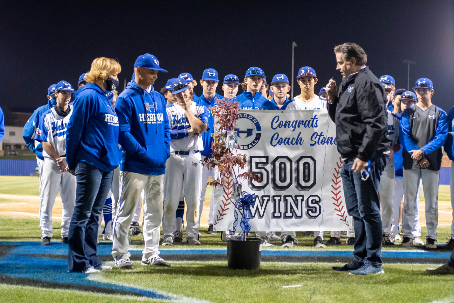 Longtime Hebron baseball coach Stone honored with jersey retirement ceremony