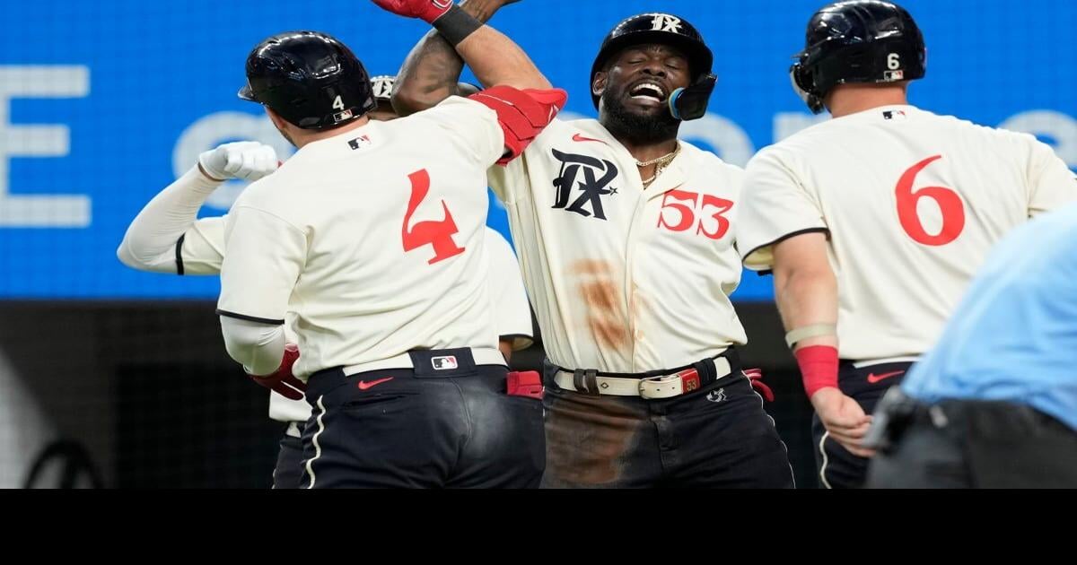 Rangers rally from 5-0 deficit to beat Marlins 9-8