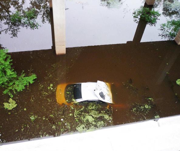 Accident on bypass leaves car submerged in water | News | stategazette.com