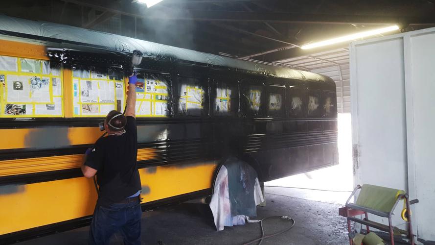 DHS senior completes Scout project, repaints Trojan band bus