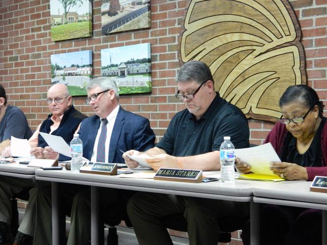 County school board OKs LED lighting bid, discusses residency policy