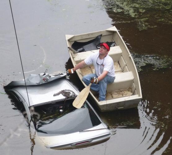 Accident on bypass leaves car submerged in water | News | stategazette.com