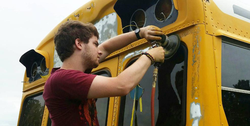 DHS senior completes Scout project, repaints Trojan band bus