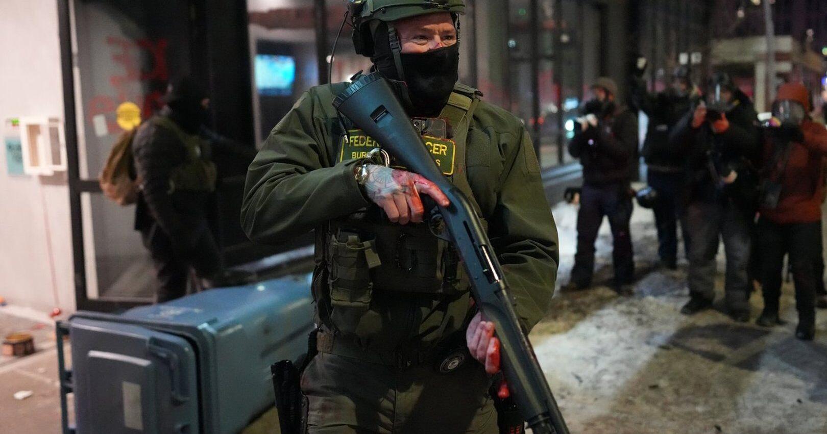 The Latest : Democrats vow to oppose homeland security funds after Minnesota shooting