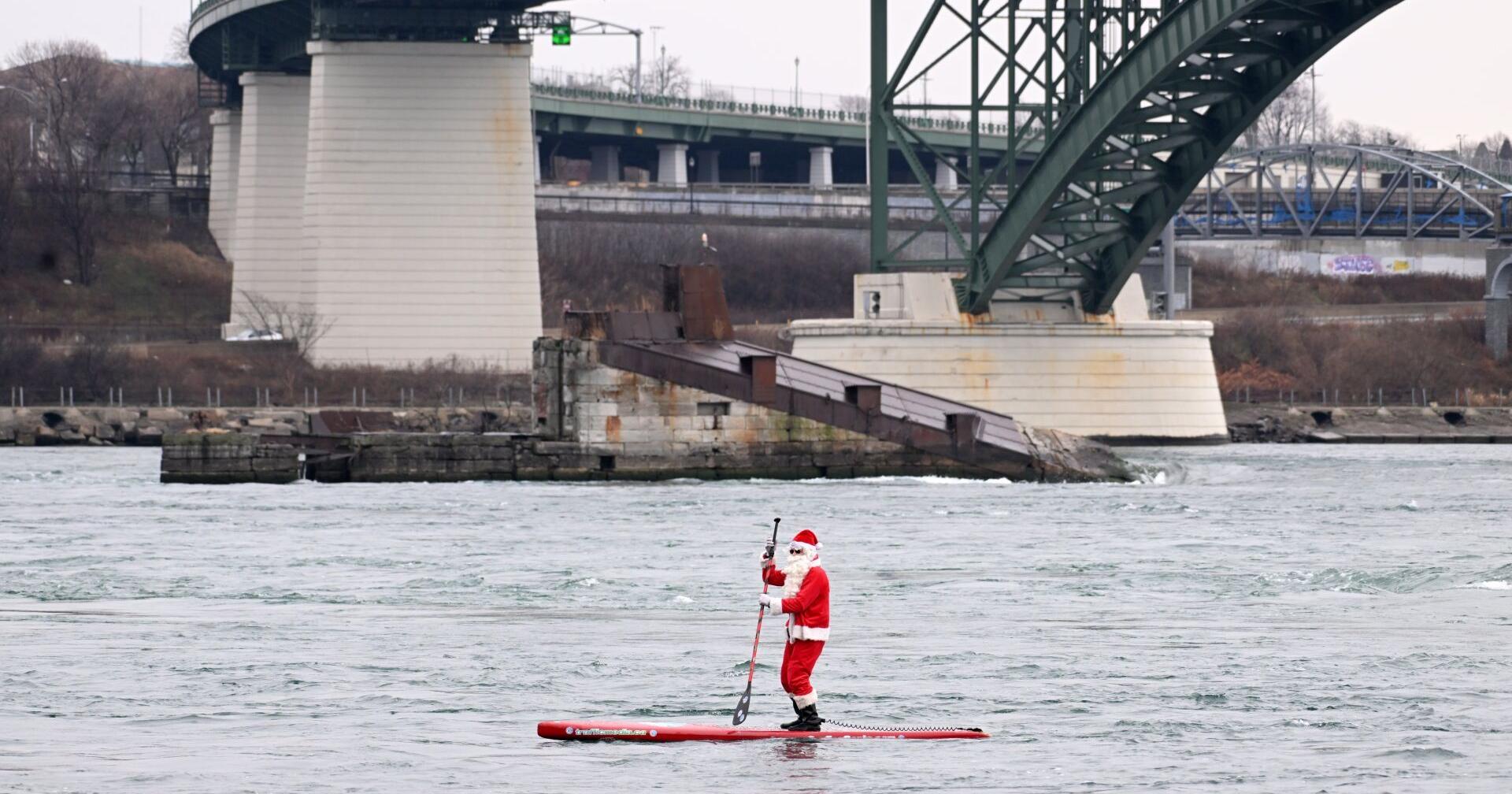 Surfing Santa paddles to raise awareness of homelessness - Vimarsana News