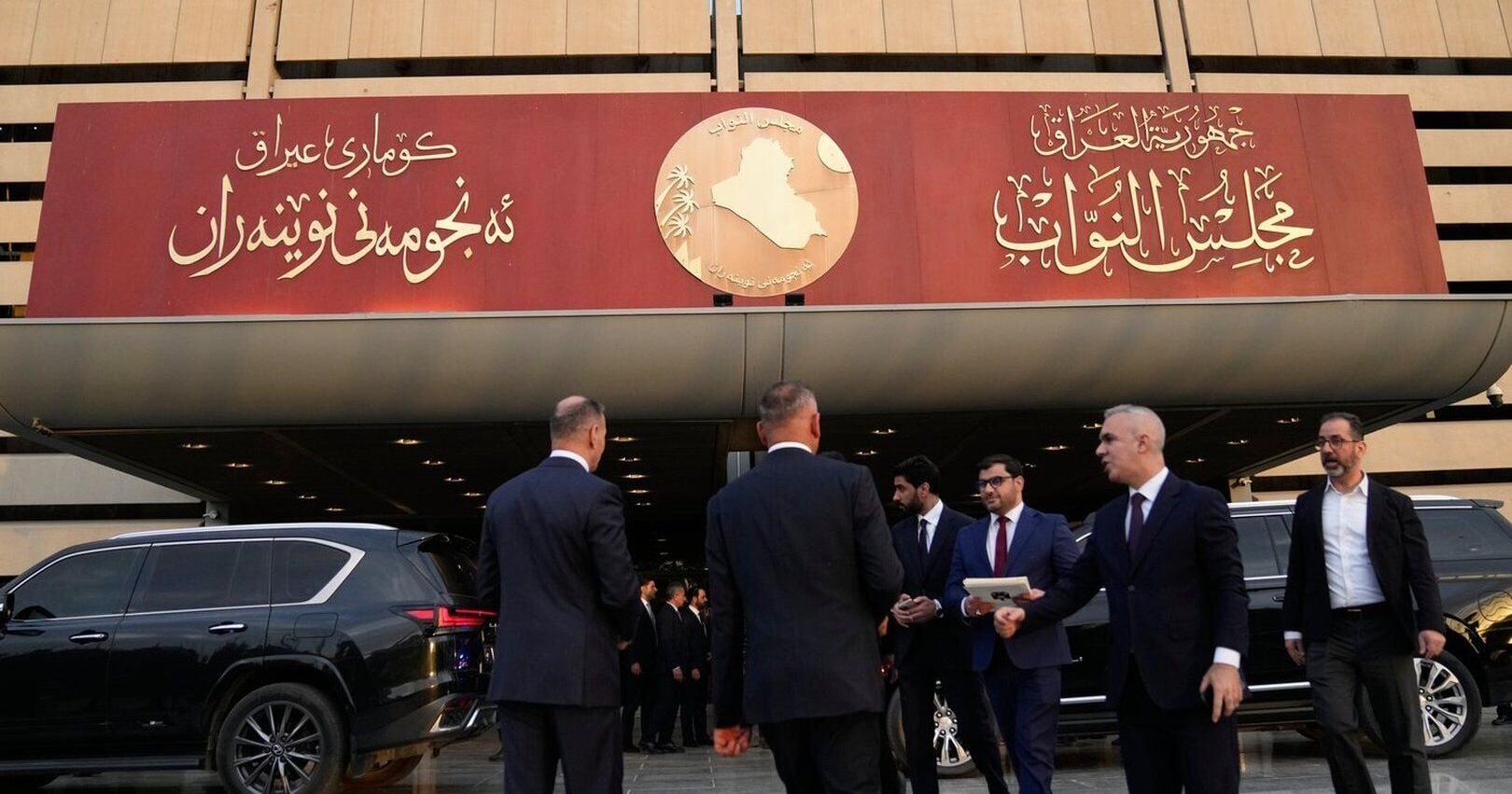 Iraq parliament fills Cabinet posts , naming a US - sanctioned deputy prime minister