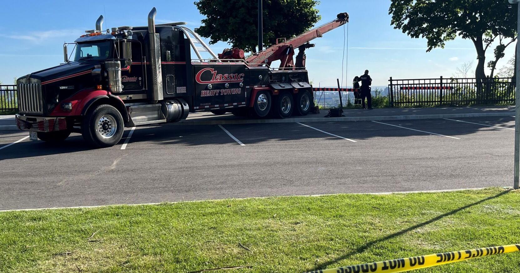 Two escape after car plunges into trees off Sherman Access - Vimarsana News