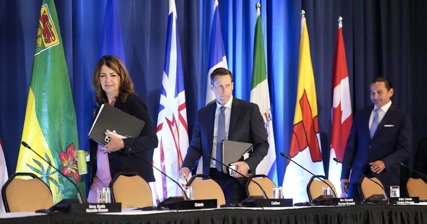 In the news : Premiers meet in P . E . I ., Canada joins international fighter jet program