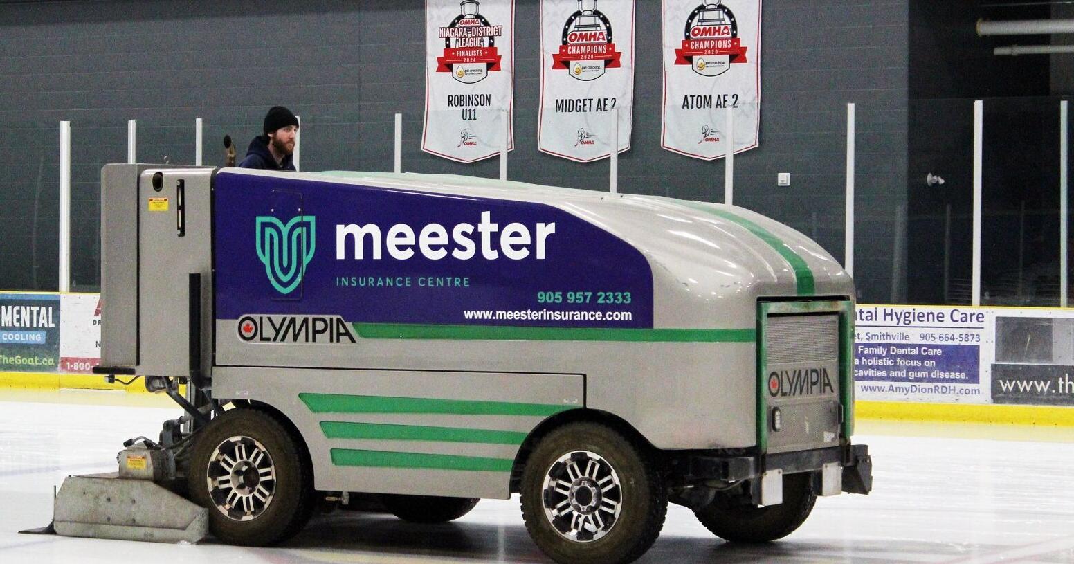 Old Smithville arena resurfacing machine being put on ice