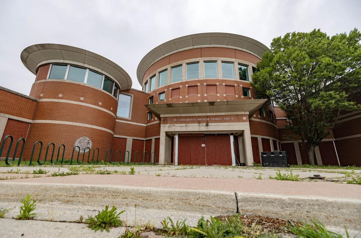 City to pay to pump water out of former Y near Fairview Mall