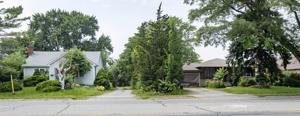 Plan for 50-unit apartment in St. Catharines, where two houses stand, opposed by neighbours