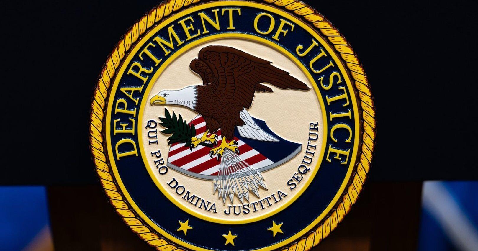 Federal prosecutor who was fired over years - old blog posts critical of Trump sues Justice Department