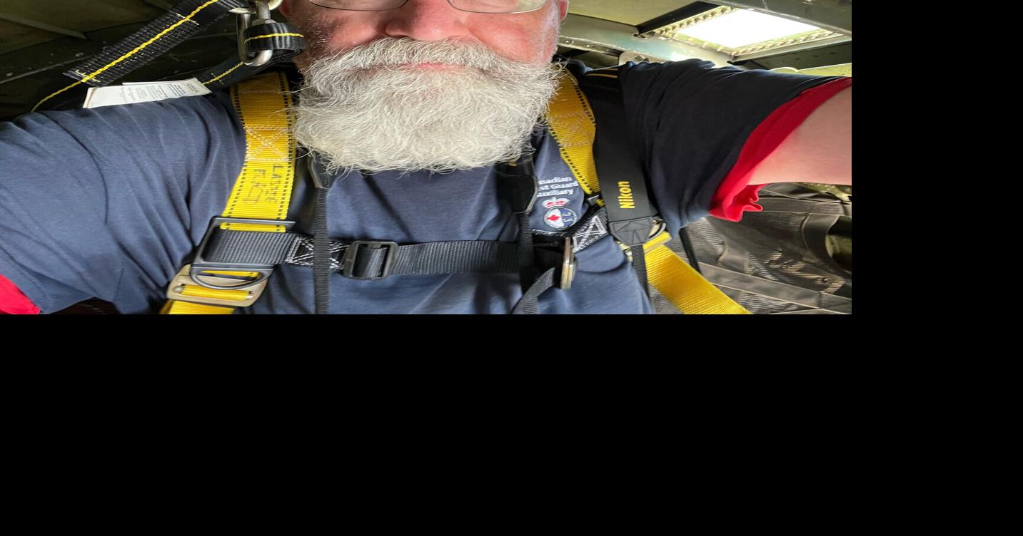 Standing at the door of an 83-year-old C-47 warplane above Niagara