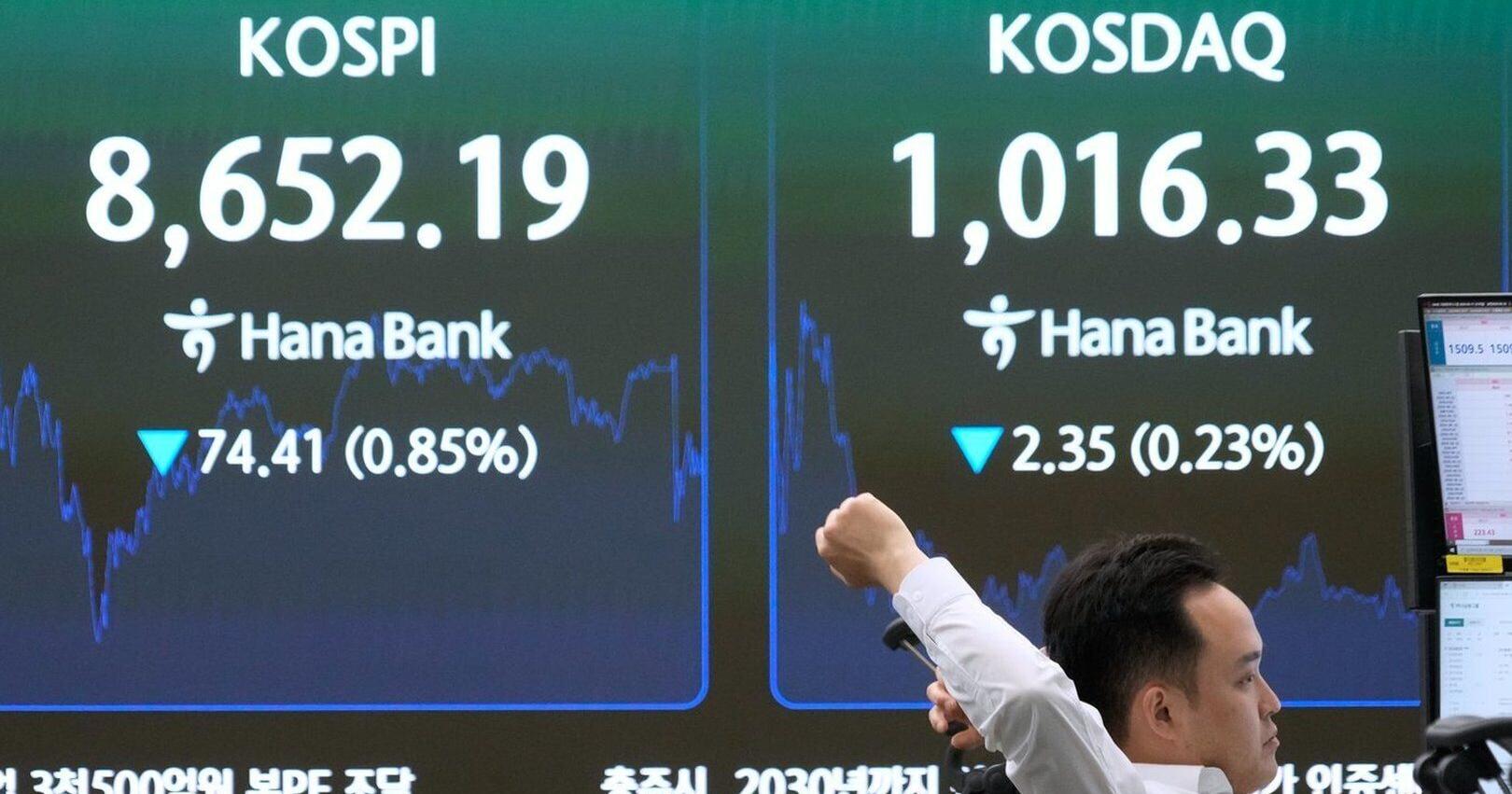 Shares are mixed and oil trades below $80 on optimism over interim US - Iran war deal