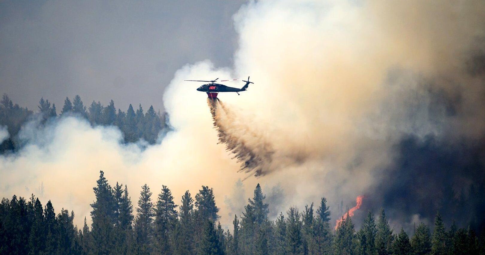 Oregon firefighters brace for windy and hot weather as they battle dozens of blazes