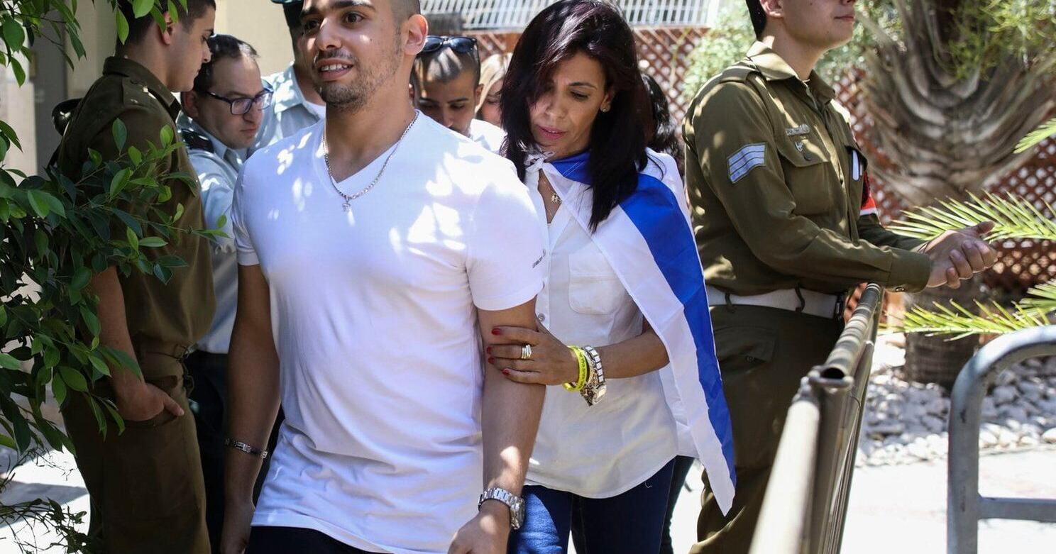 Israel president pardons a combat medic whose shooting of a Palestinian attacker caused debate