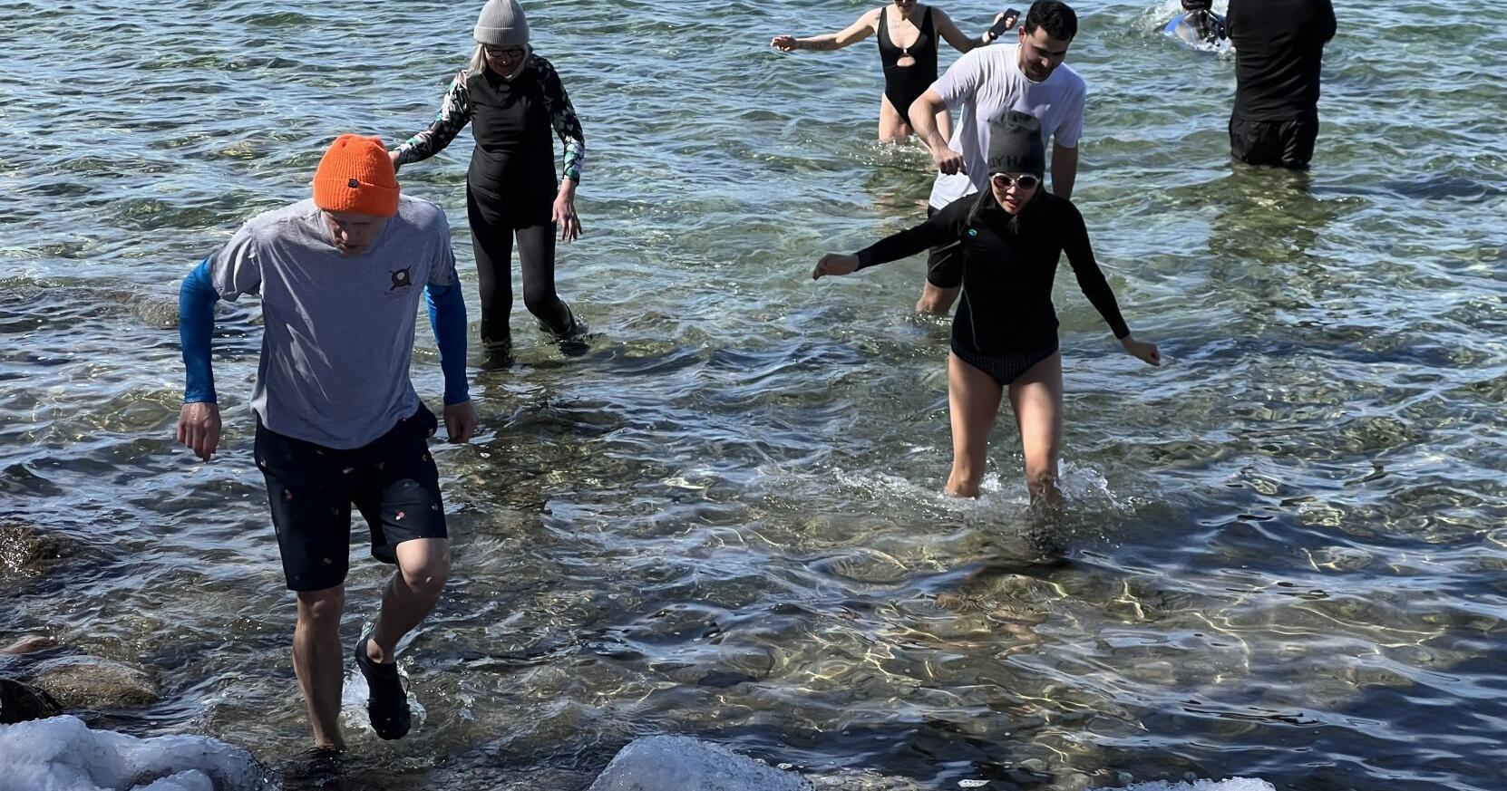 Journalists swim in Lake Simcoe to support Evan Gershkovich - Vimarsana News