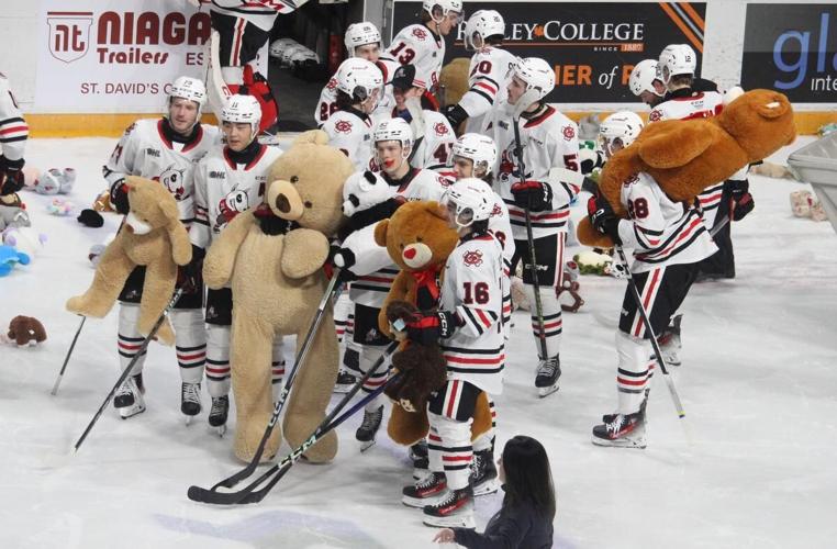 IceDogs collect toys in Teddy Bear Toss Game