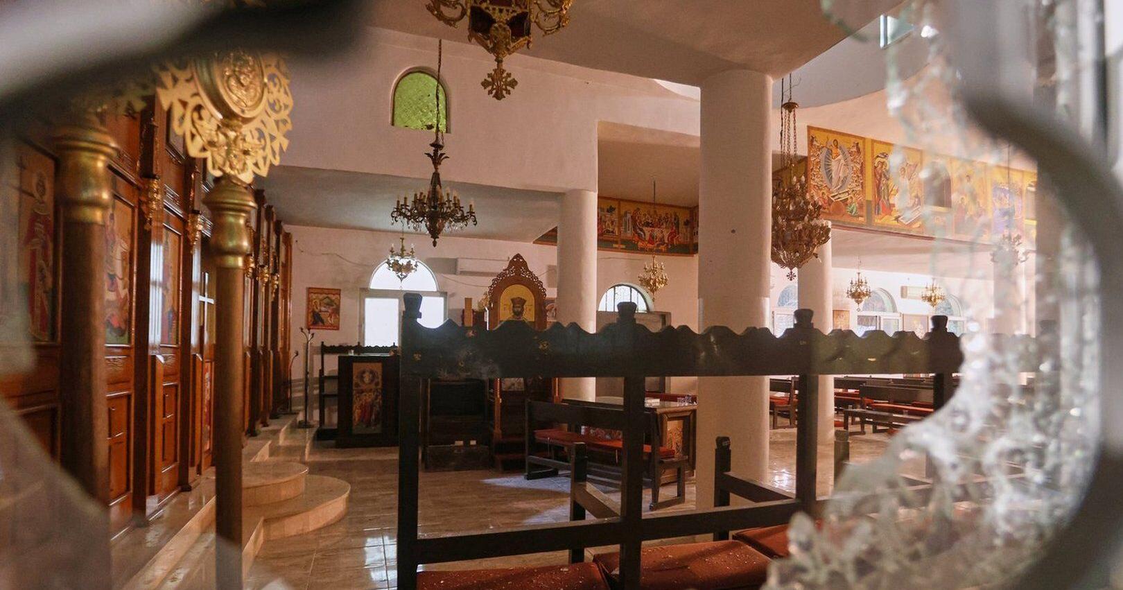Survivor of deadly attack on Jordan church describes people crawling for their lives