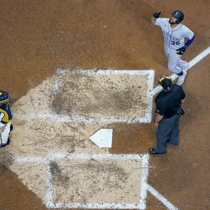 Rockies get three bases-loaded walks in 10th inning, beat NL  Central-leading Brewers 7-3