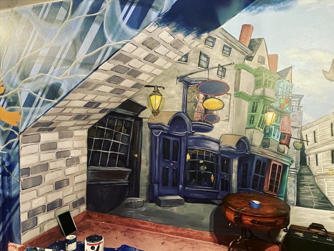 St. George artist brushes her way around town through murals, portraits ...