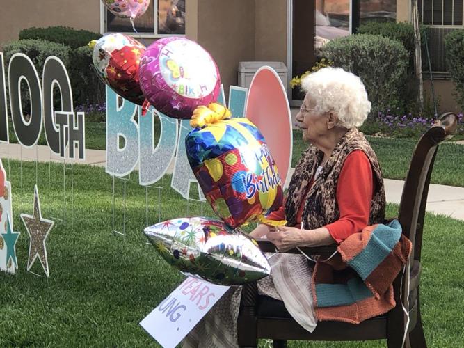 Community puts on parade of the century for assisted living residents