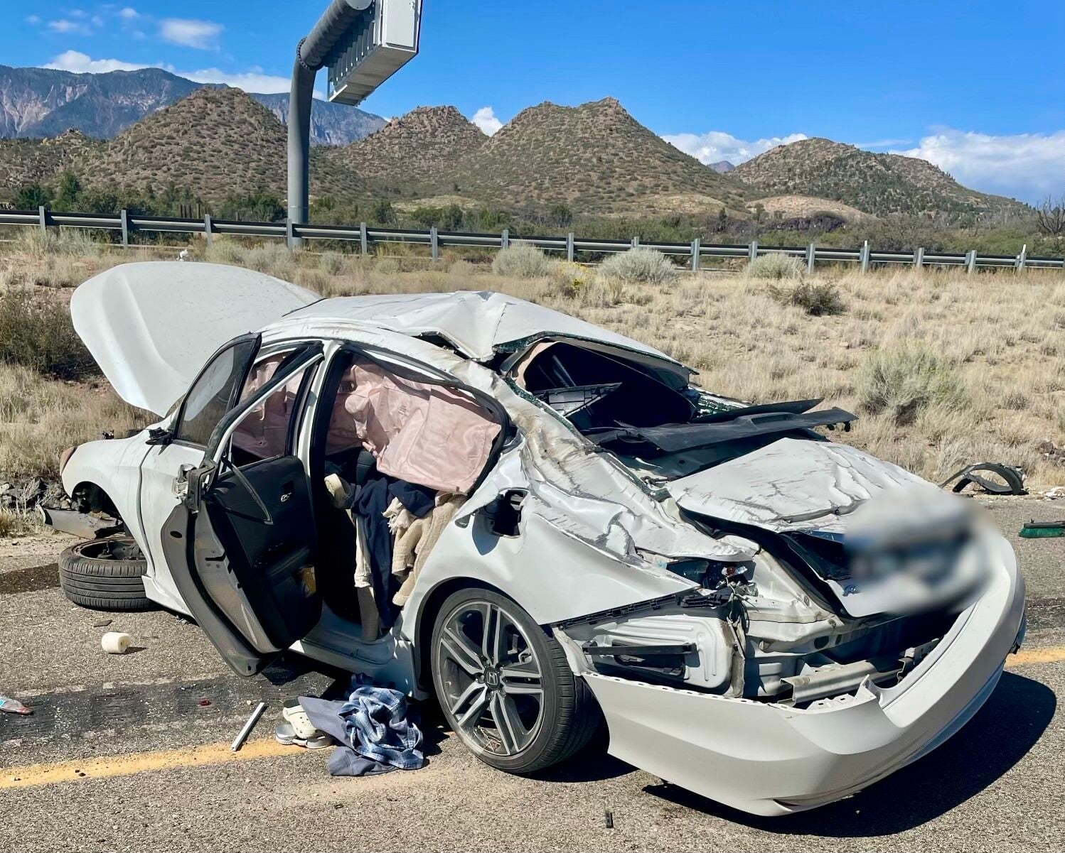 Car rolls multiple times on I-15 in Washington County when driver ...