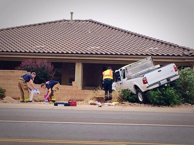 70-year-old man taken to hospital after crashing through block wall ...
