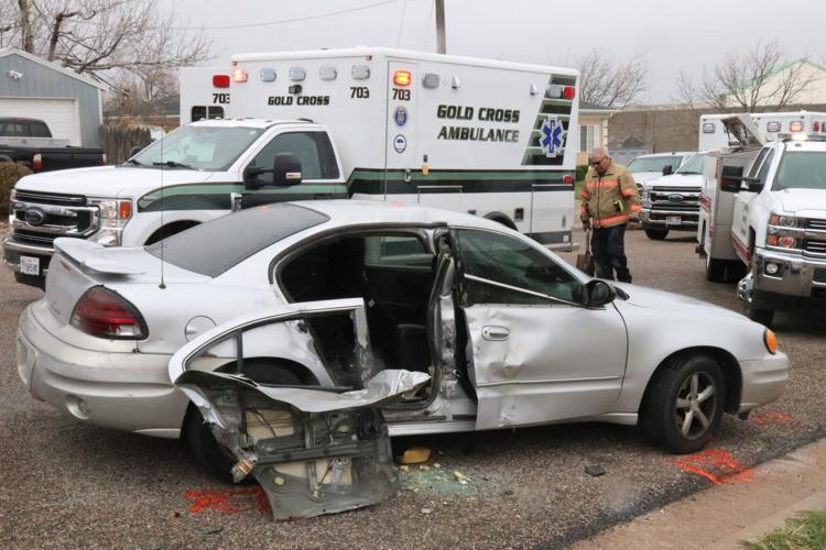 Police Motorcyclist reportedly ran stop sign, collided with car in