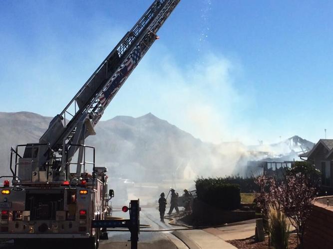 News LIVE Hurricane house fire contained; crews still on scene