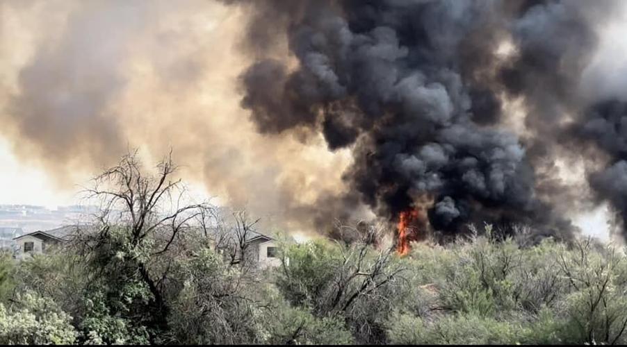News LIVE: Brush fire threatens structures near Mall Drive in St ...